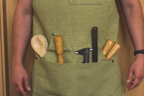 Reguliuojamo dydžio darbinė prijuostė iš žalios drobės