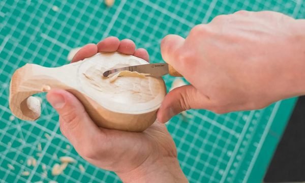 Drožinėjimo peilis lenktais ašmenimis